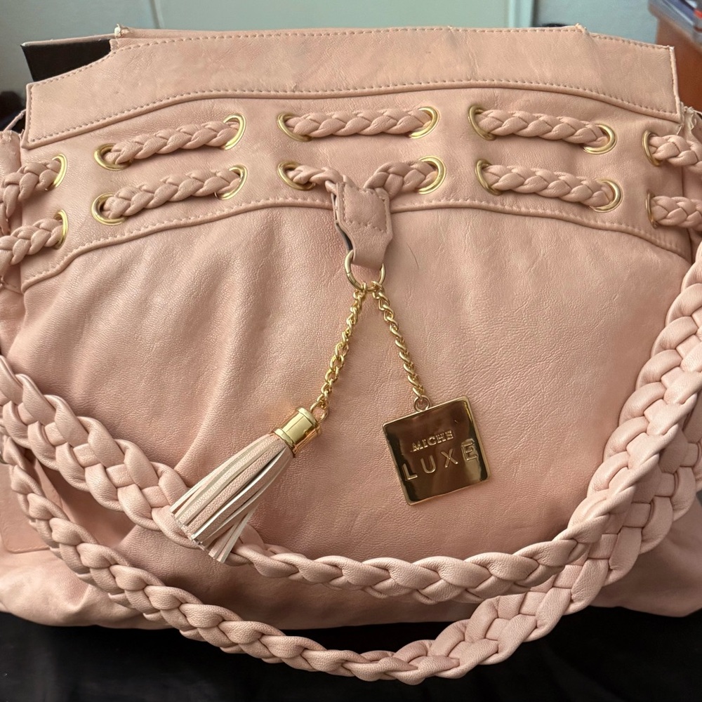 Miche Luxe Catalina purse minor wear on corners near handles.